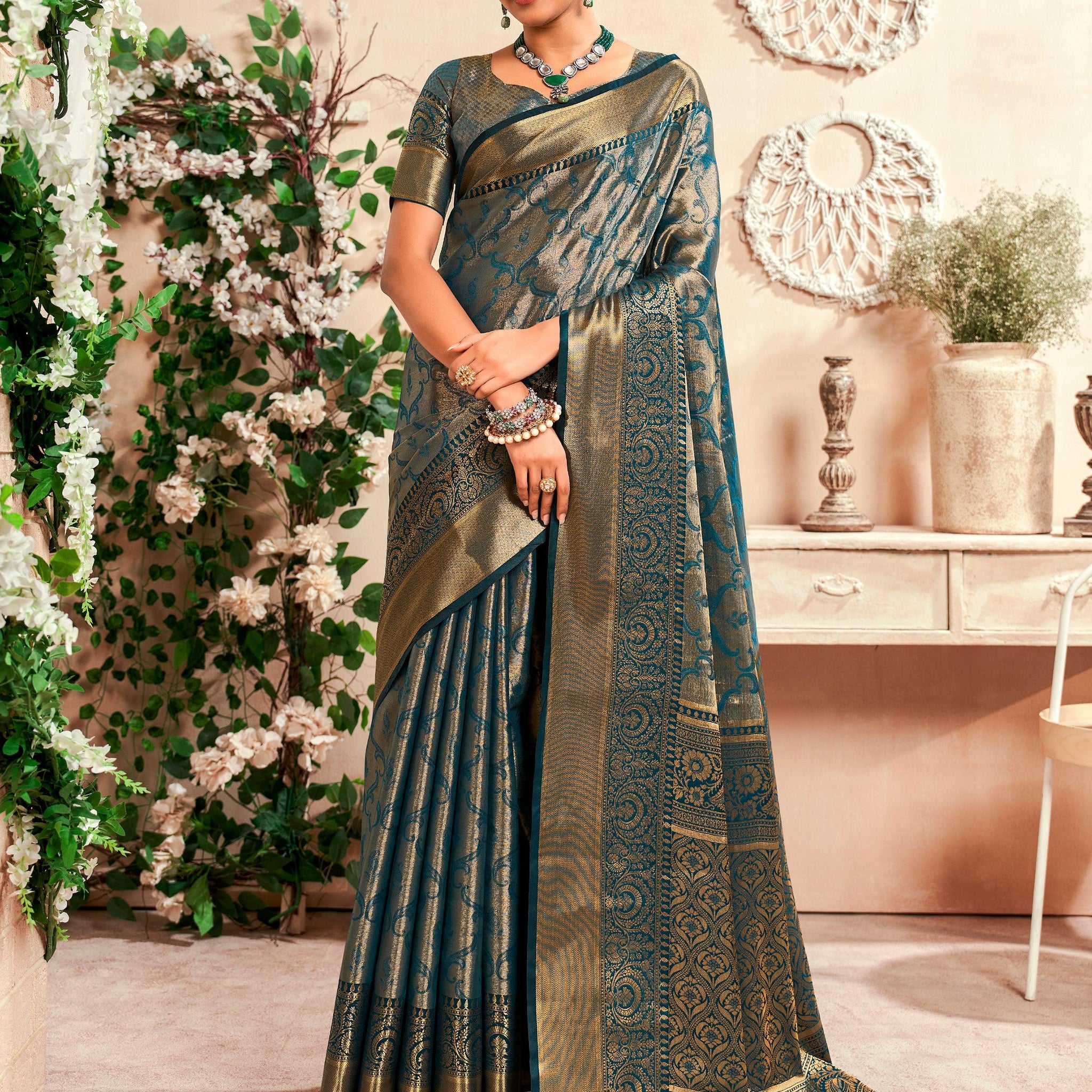 Bewitching Teal Blue Zari Weaving Silk Traditional Saree With Blouse