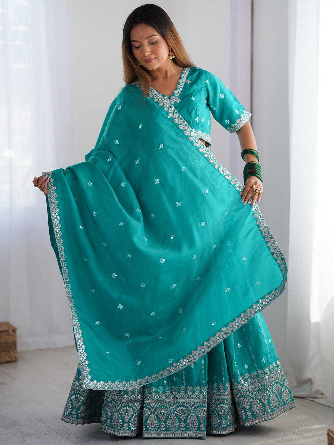 Wonderful Teal Green Thread Embroidered Silk Wedding Lehenga Choli