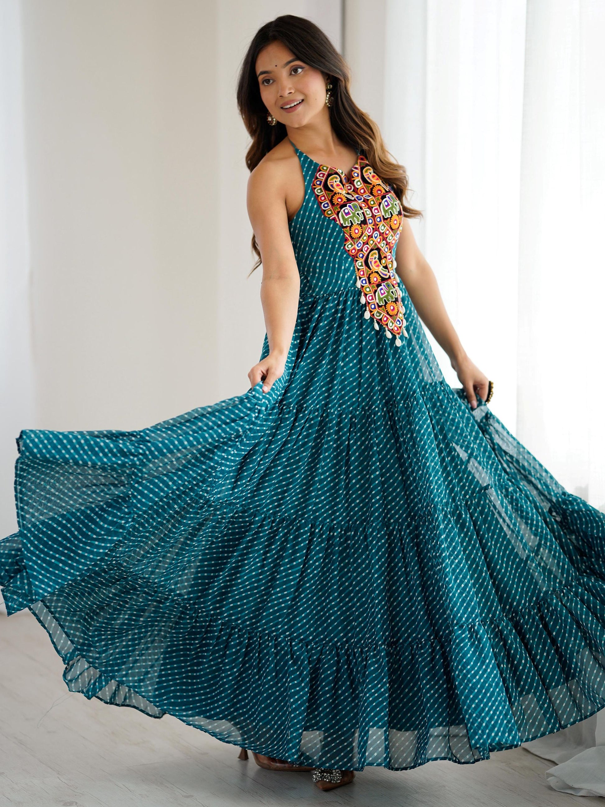 Awesome Teal Blue Laheriya Printed Georgette Navratri Special Gown