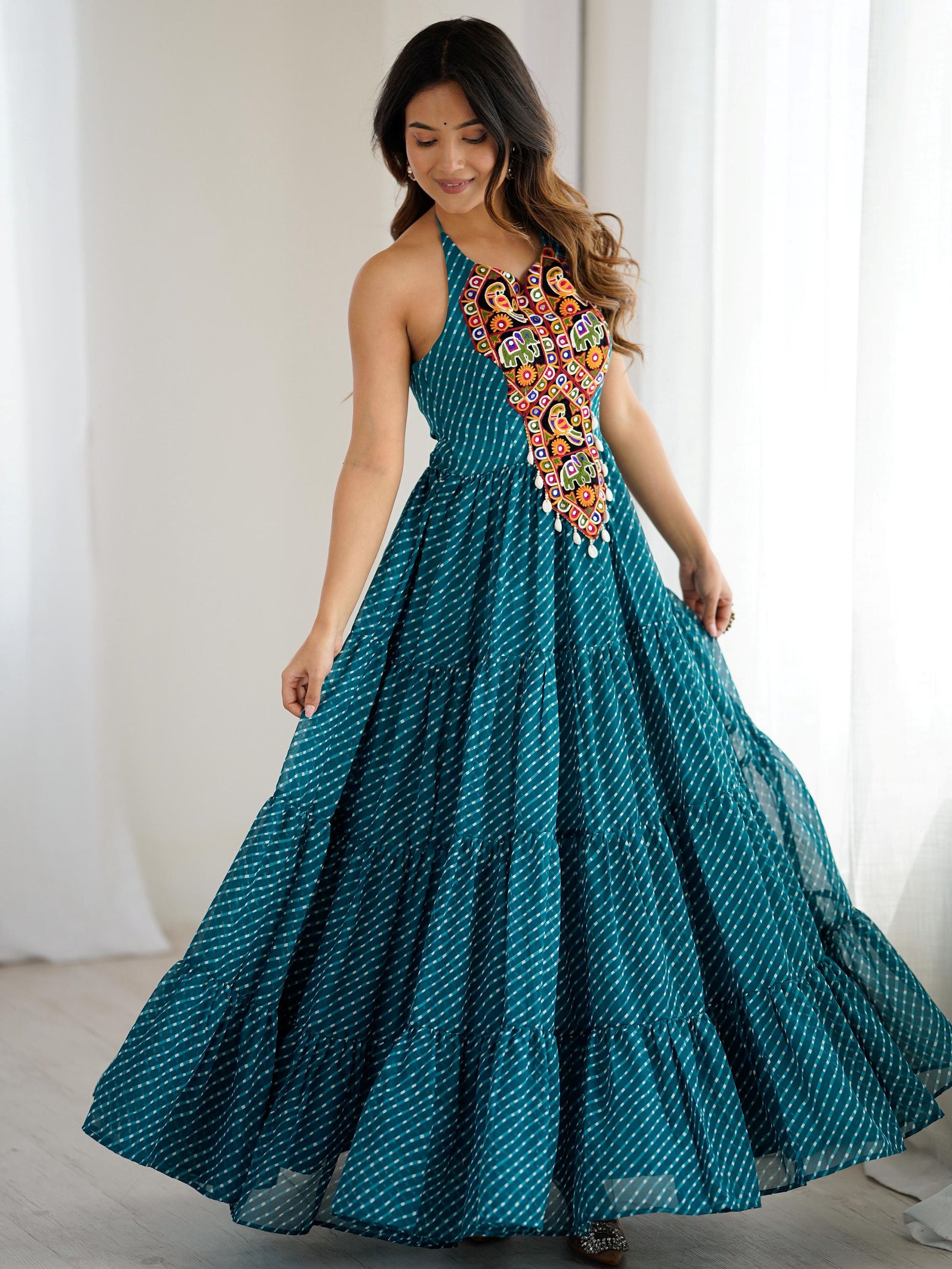 Awesome Teal Blue Laheriya Printed Georgette Navratri Special Gown