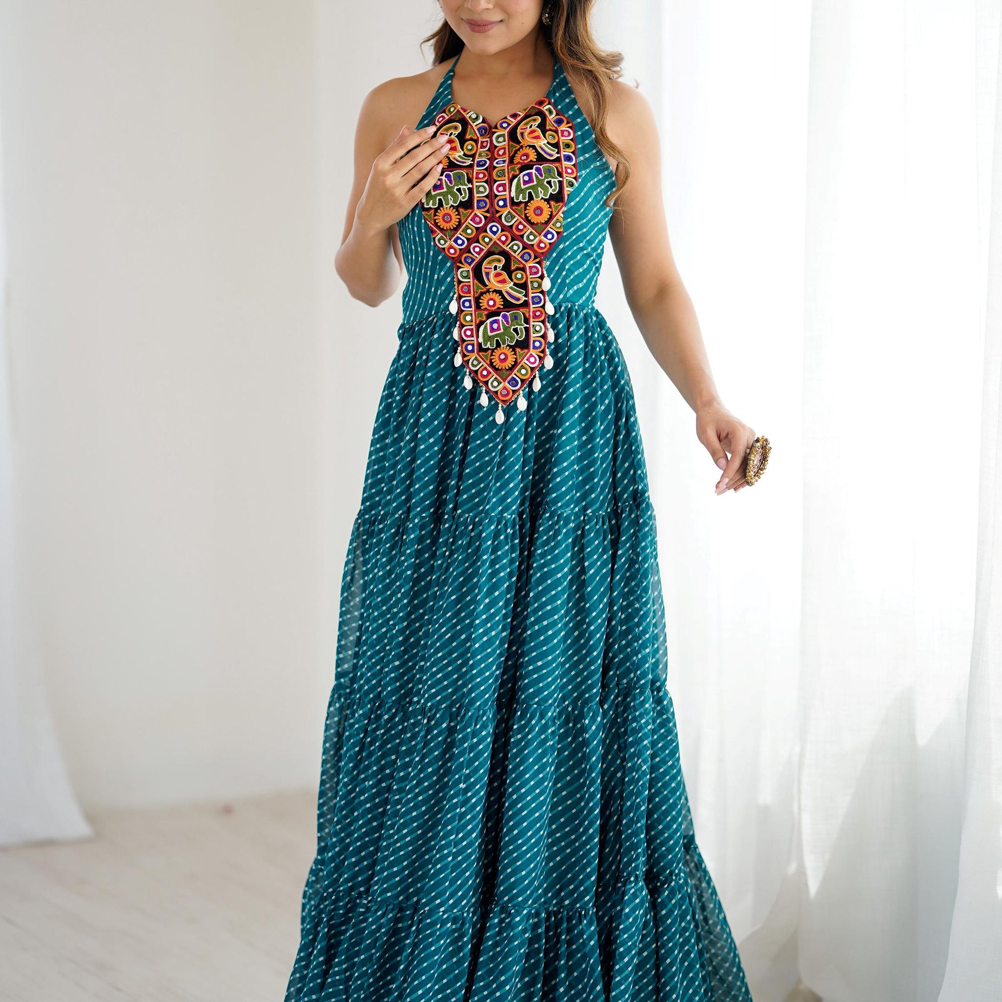Awesome Teal Blue Laheriya Printed Georgette Navratri Special Gown