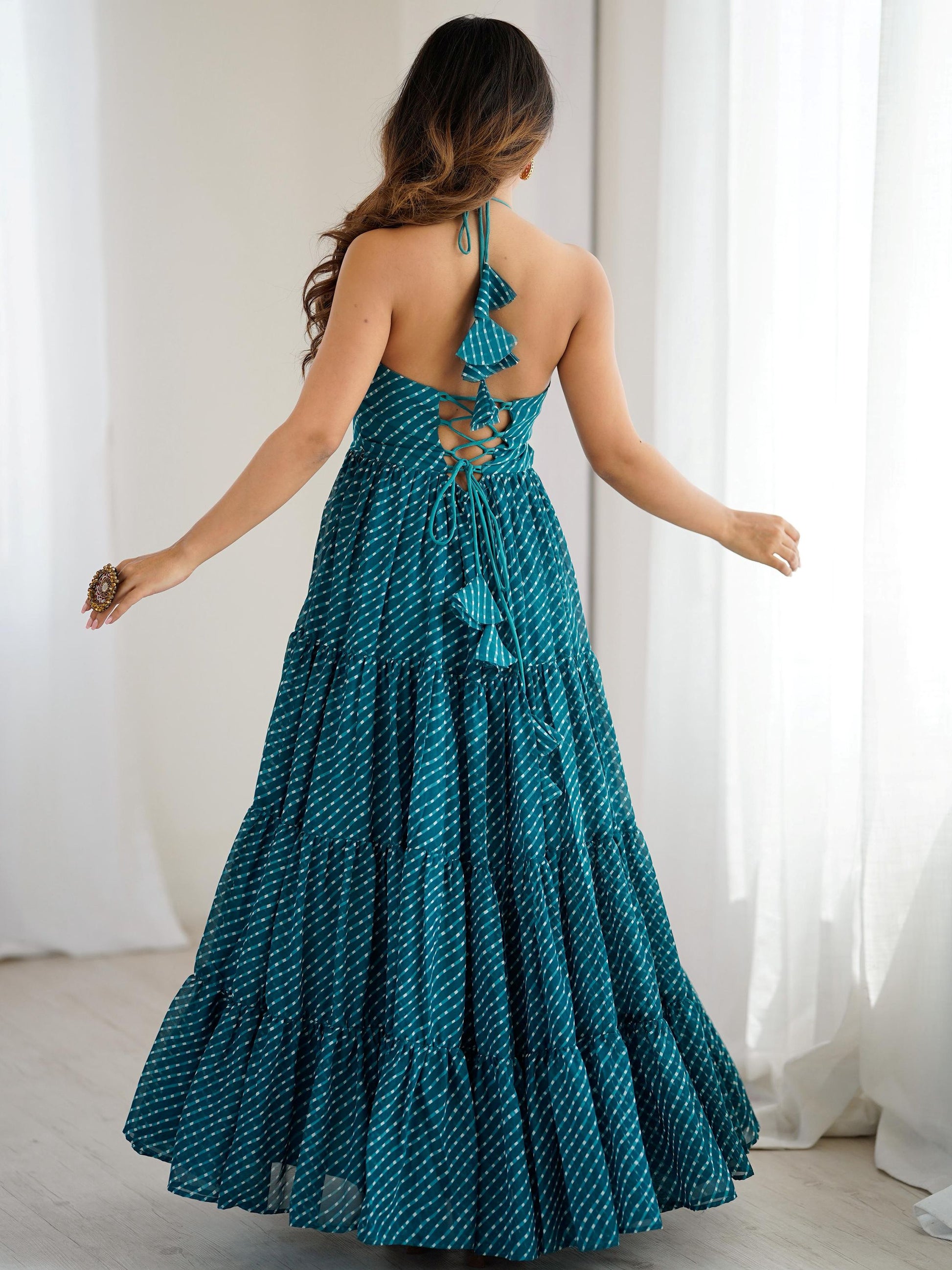 Awesome Teal Blue Laheriya Printed Georgette Navratri Special Gown