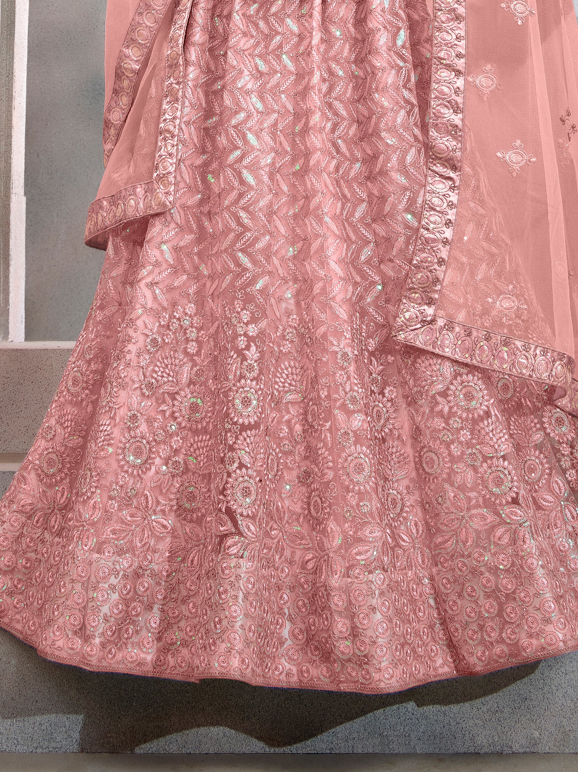 Precious Peach Thread Embroidery Net Party Wear Lehenga Choli