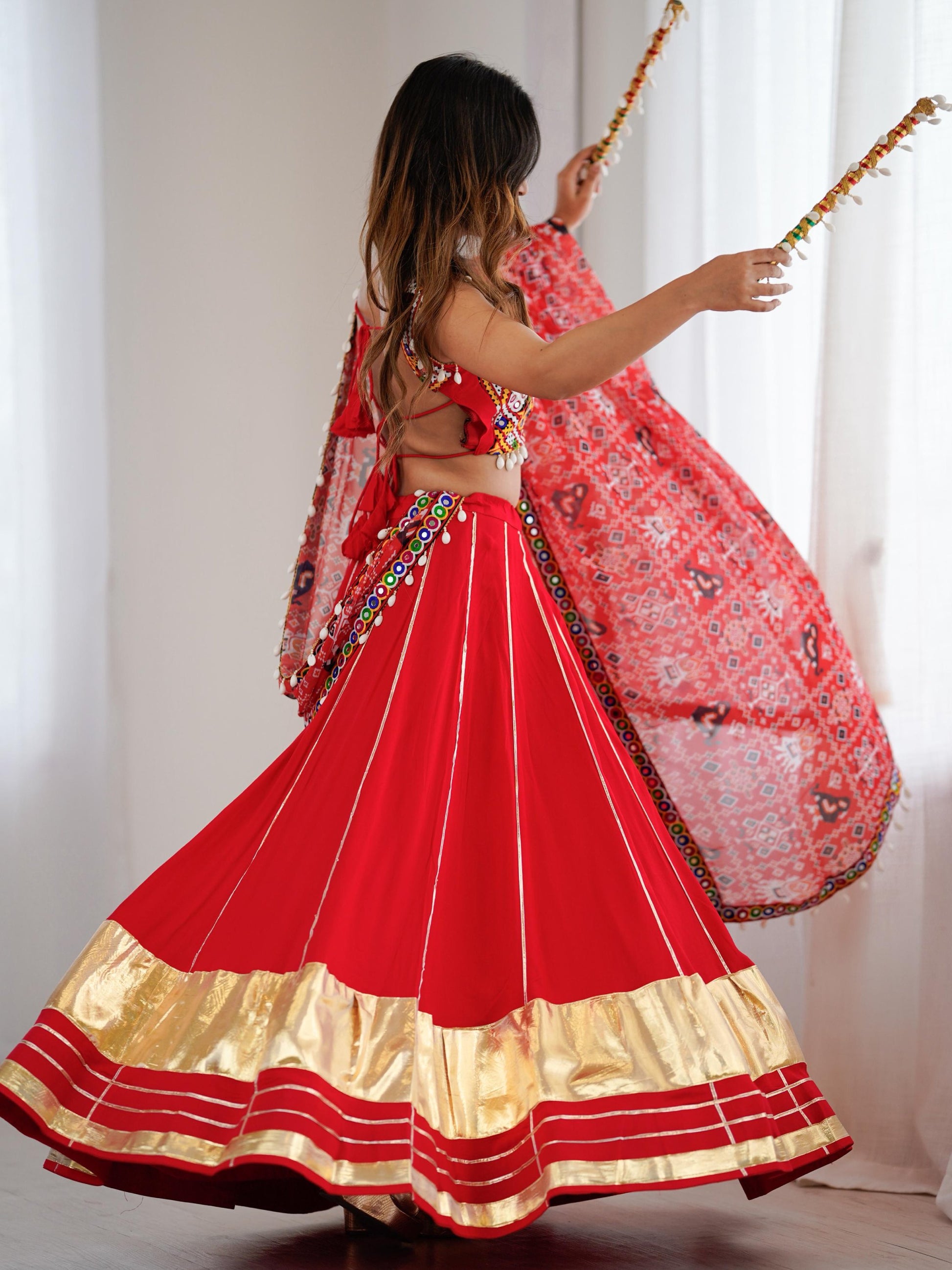 Lavish Red Rayon Navratri Special Lehenga With Gamthi Work Choli
