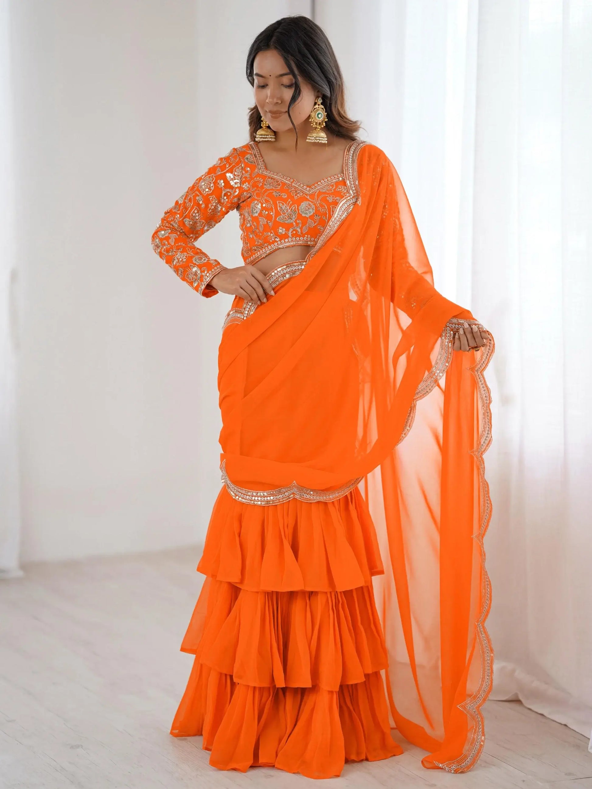 Lovely Orange Georgette Party Wear Ruffle Lehenga Saree With Embroidered Blouse