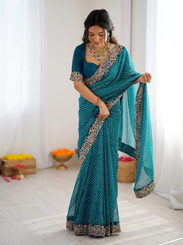 Enchanting Teal Blue Sequins Work Georgette Function Wear Saree