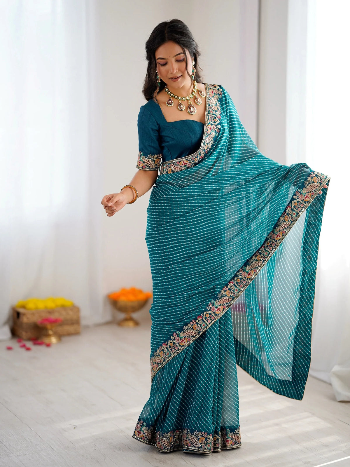 Enchanting Teal Blue Sequins Work Georgette Function Wear Saree