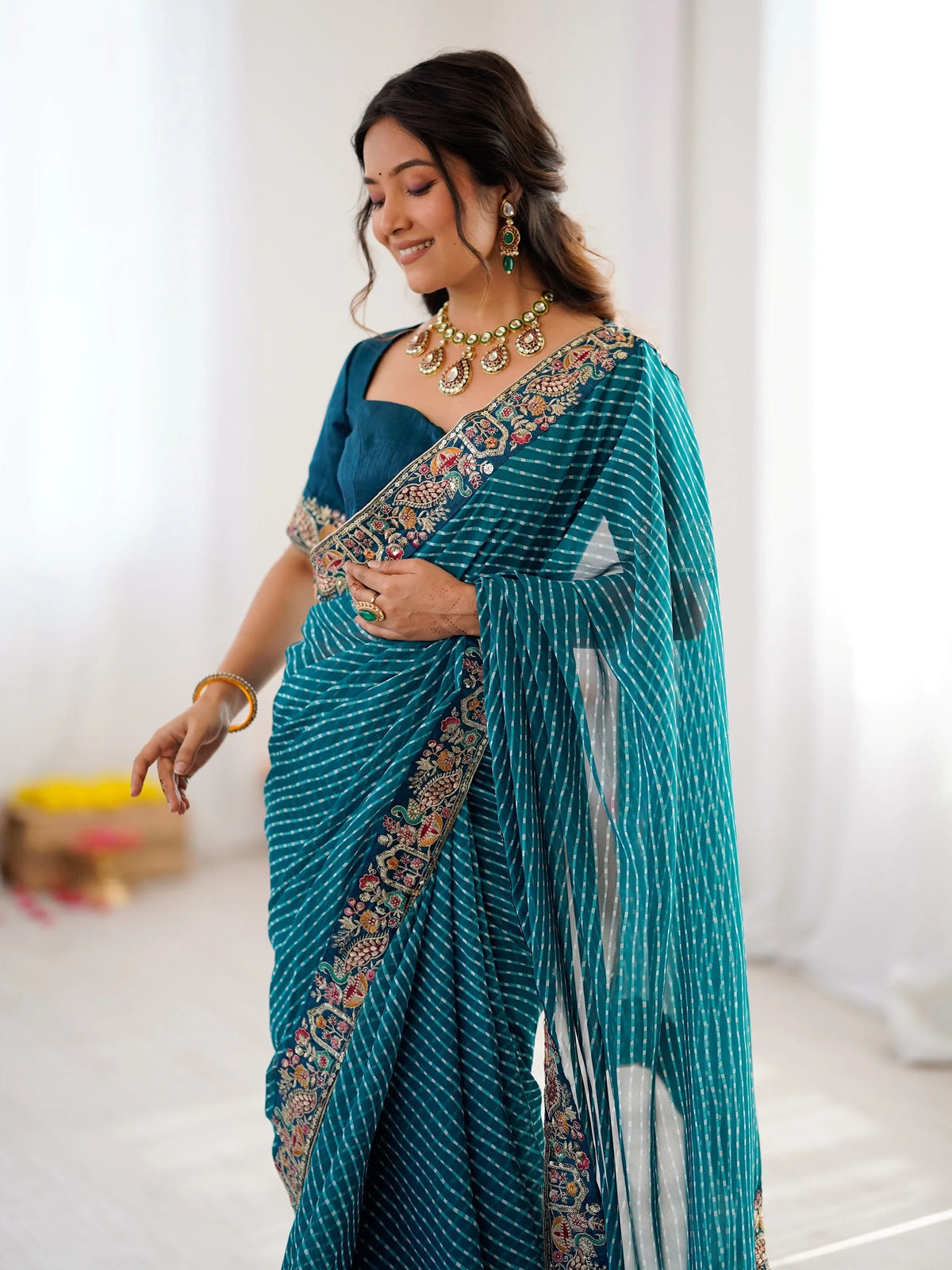 Enchanting Teal Blue Sequins Work Georgette Function Wear Saree