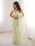 Fascinating Pista Green Sequins Work Net Festival Wear Saree