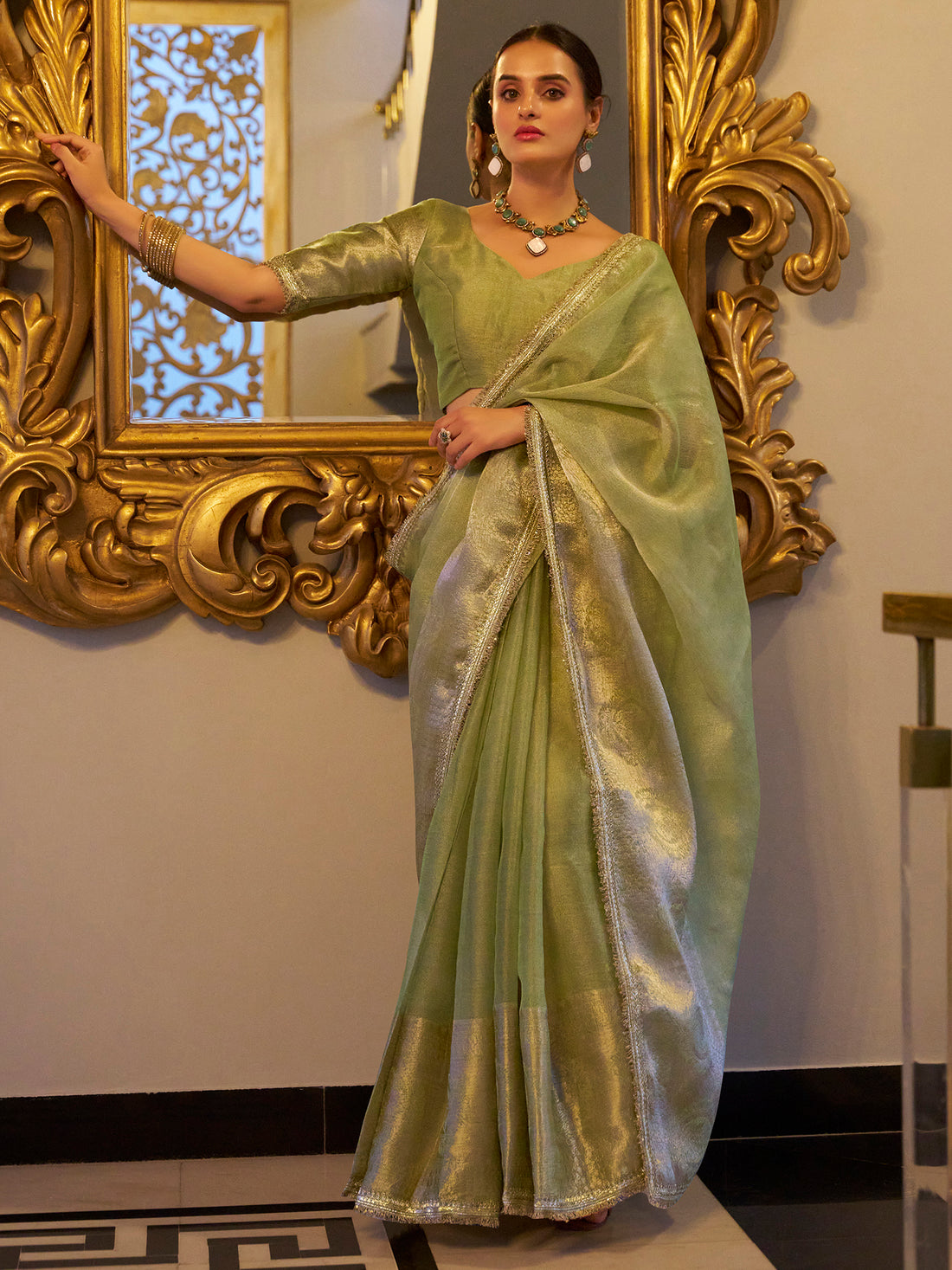 Precious Pista Green Zari Weaving Tissue Silk Event Wear Saree