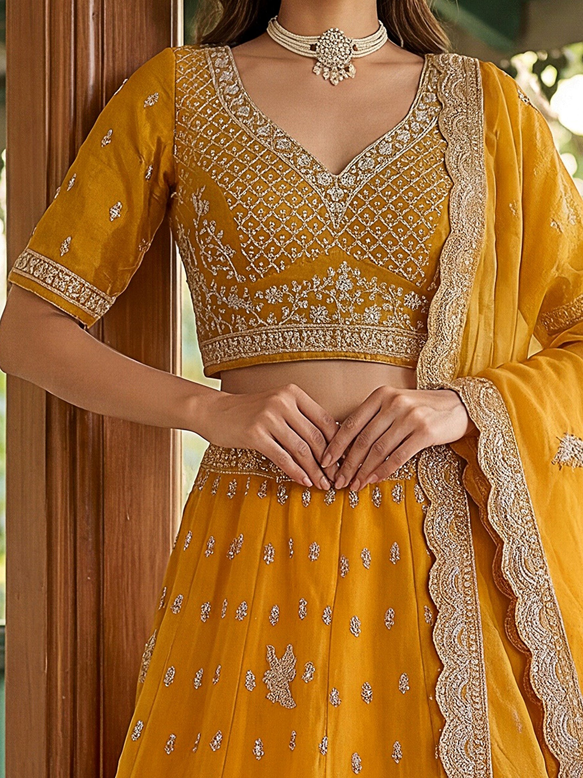 Glamorous Mustard Yellow Embroidered Organza Wedding Wear Lehenga Choli With Dupatta