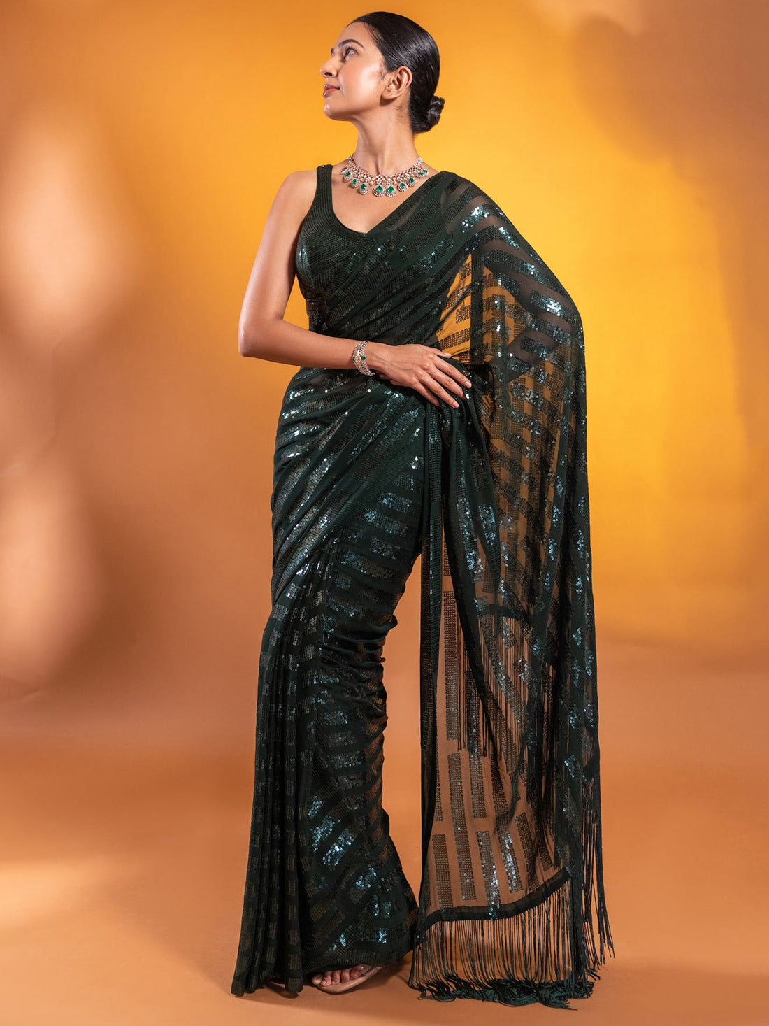 Attractive Dark Green Sequins Georgette Mehendi Wear Saree