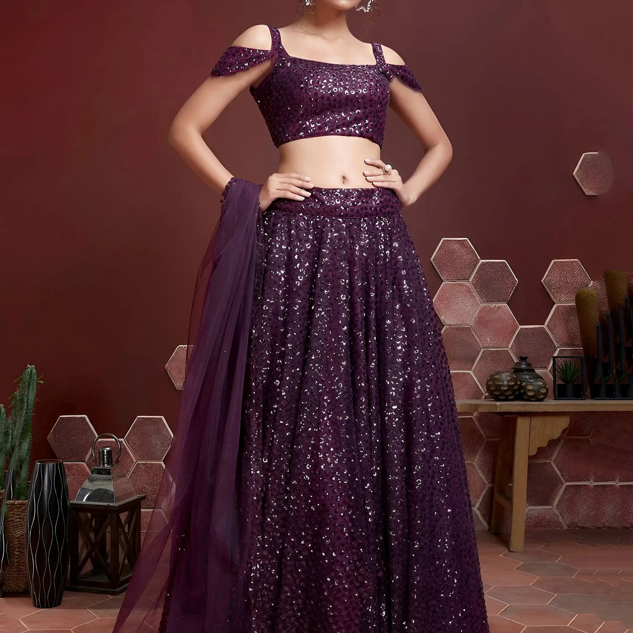 Elegant Purple Sequins Embroidered Net Party Wear Lehenga Choli