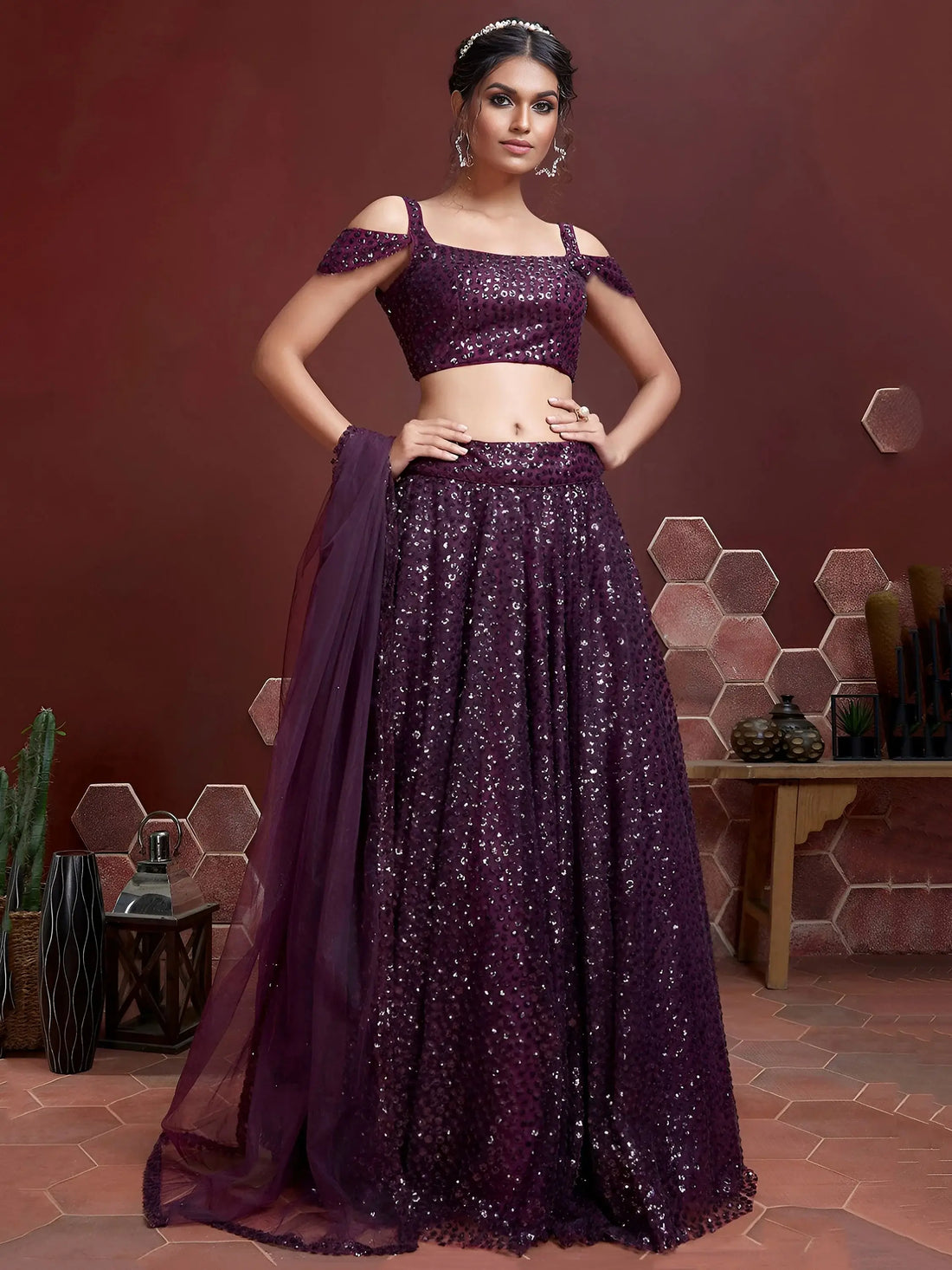 Elegant Purple Sequins Embroidered Net Party Wear Lehenga Choli