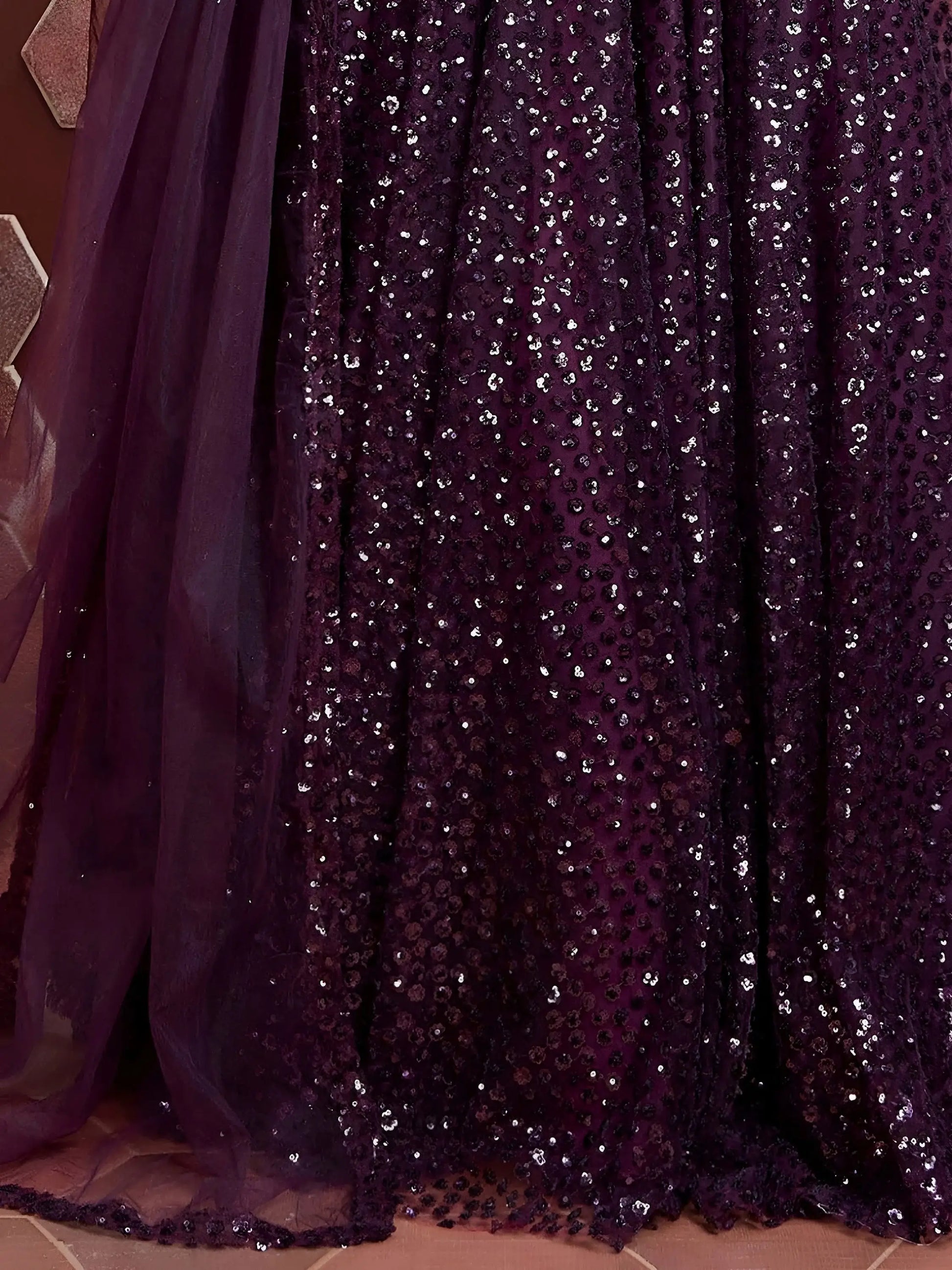 Elegant Purple Sequins Embroidered Net Party Wear Lehenga Choli