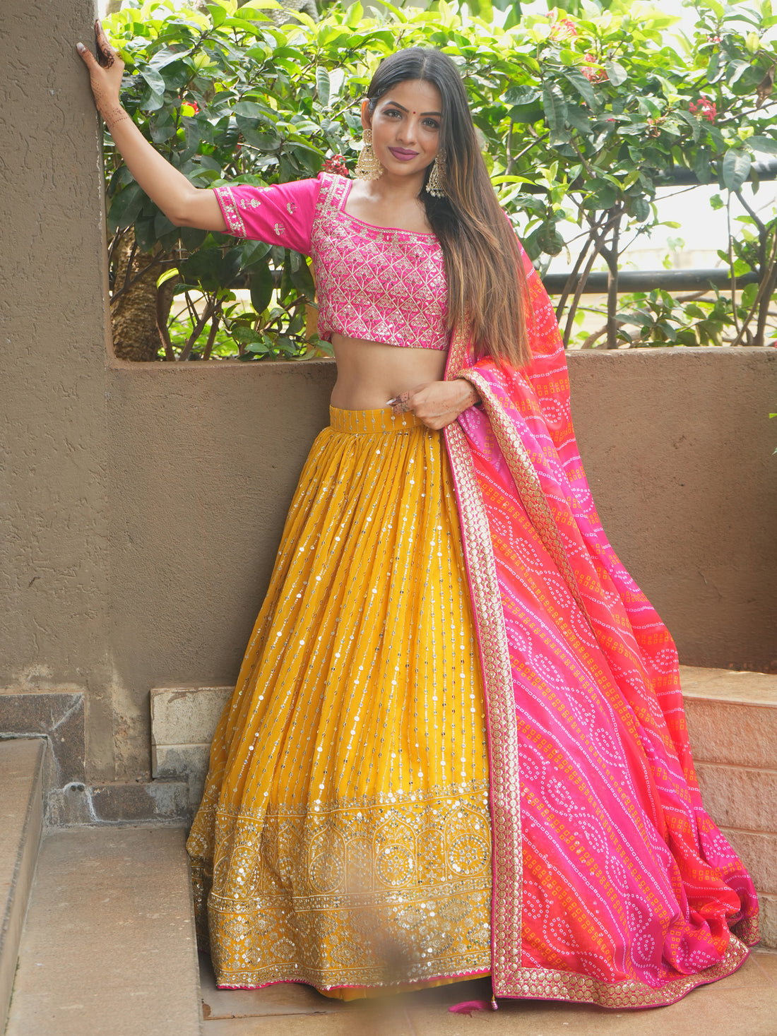 Glamorous Yellow Sequins Georgette Haldi Wear Lehenga Choli