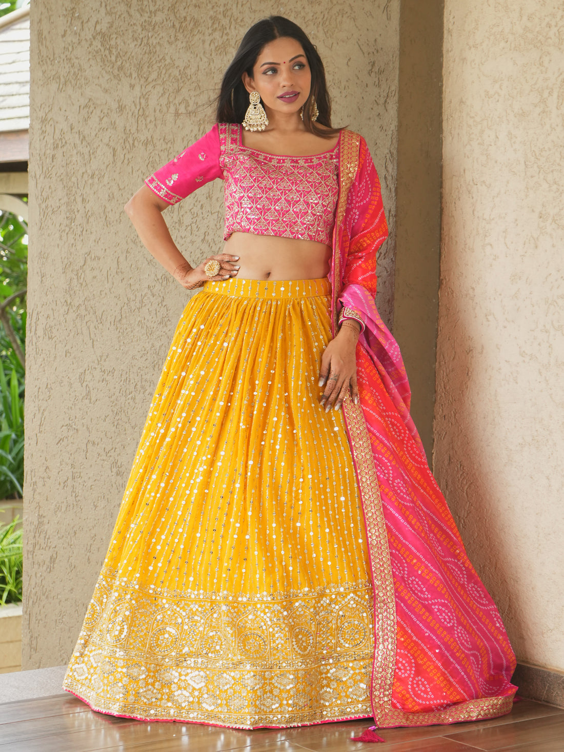 Glamorous Yellow Sequins Georgette Haldi Wear Lehenga Choli