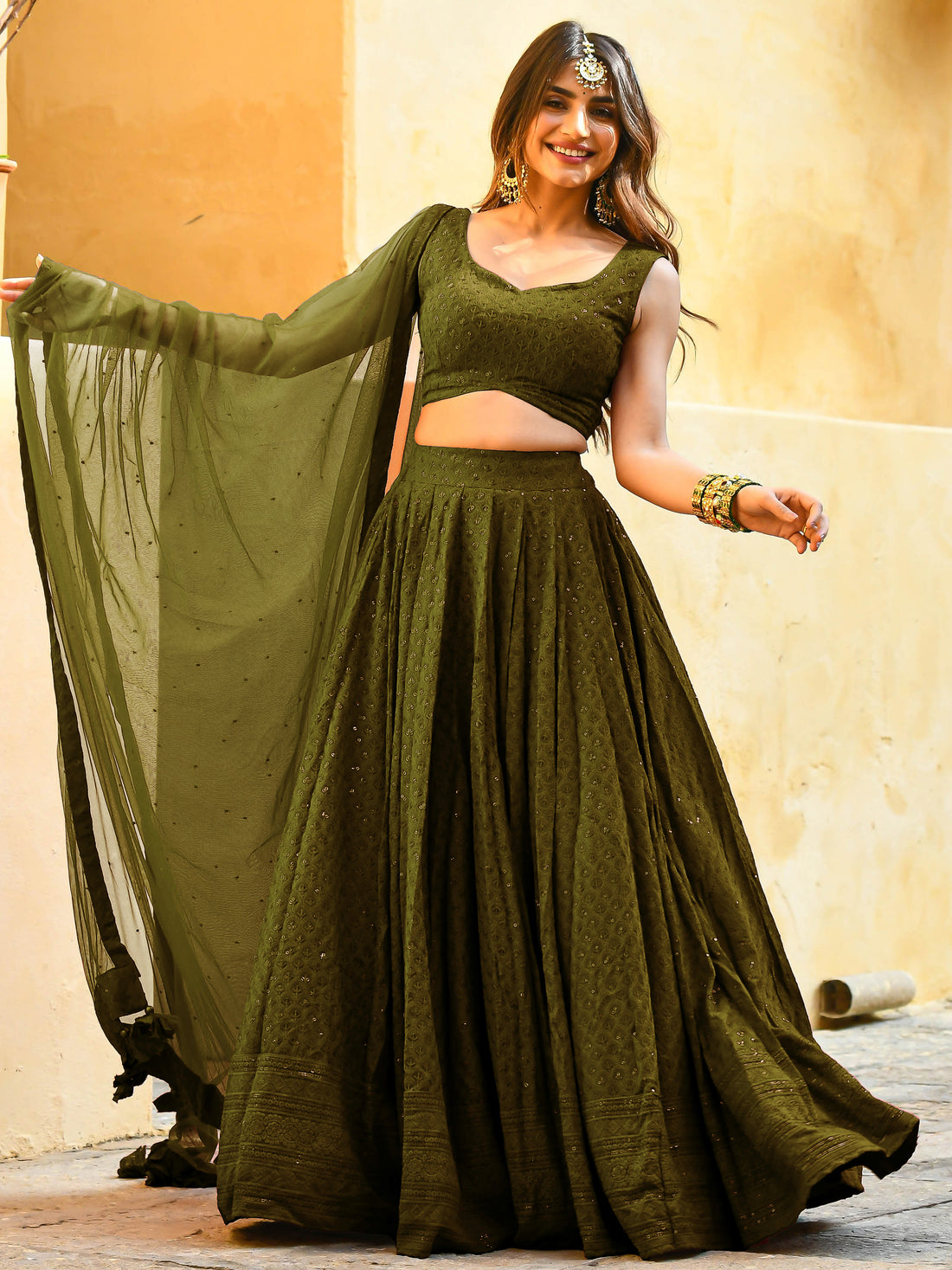 Bewitching Mehendi Green Sequins Georgette Lehenga Choli With Net Dupatta