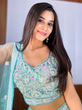 Mesmerizing Blue Sequins Net Party Wear Lehenga Choli With Dupatta