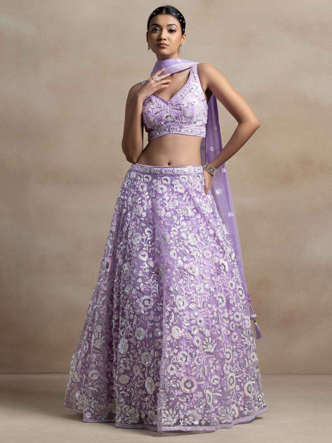 Surprising Lavender Sequins Net Reception Wear Lehenga Choli