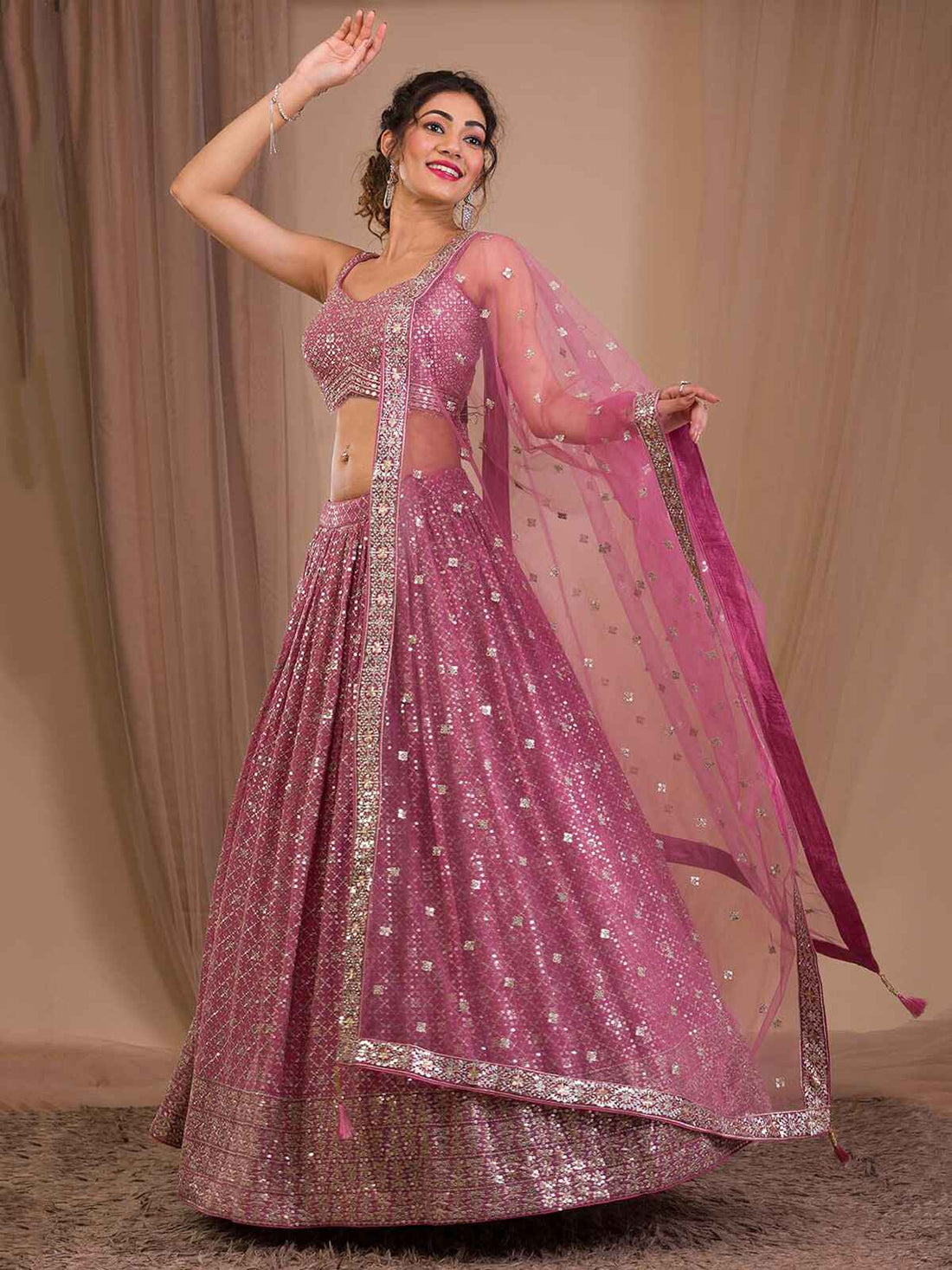 Attractive Pink Sequins Georgette Engagement Wear Lehenga Choli