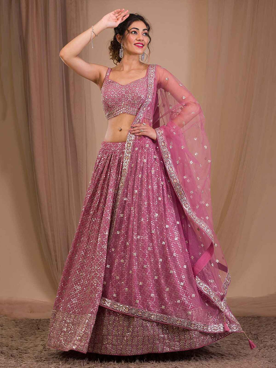 Attractive Pink Sequins Georgette Engagement Wear Lehenga Choli