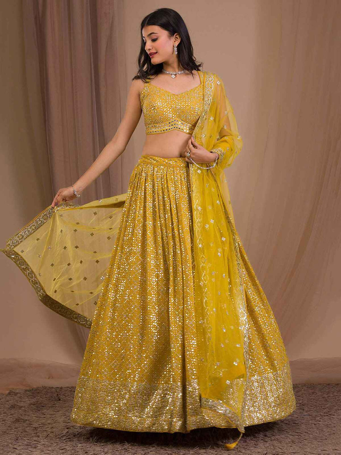 Alluring Yellow Sequins Georgette Haldi Wear Lehenga Choli