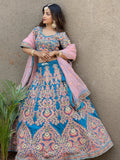 Attractive Blue Embroidered Velvet Wedding Wear Lehenga Choli