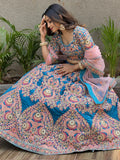 Attractive Blue Embroidered Velvet Wedding Wear Lehenga Choli