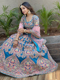 Attractive Blue Embroidered Velvet Wedding Wear Lehenga Choli