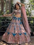 Attractive Blue Embroidered Velvet Wedding Wear Lehenga Choli