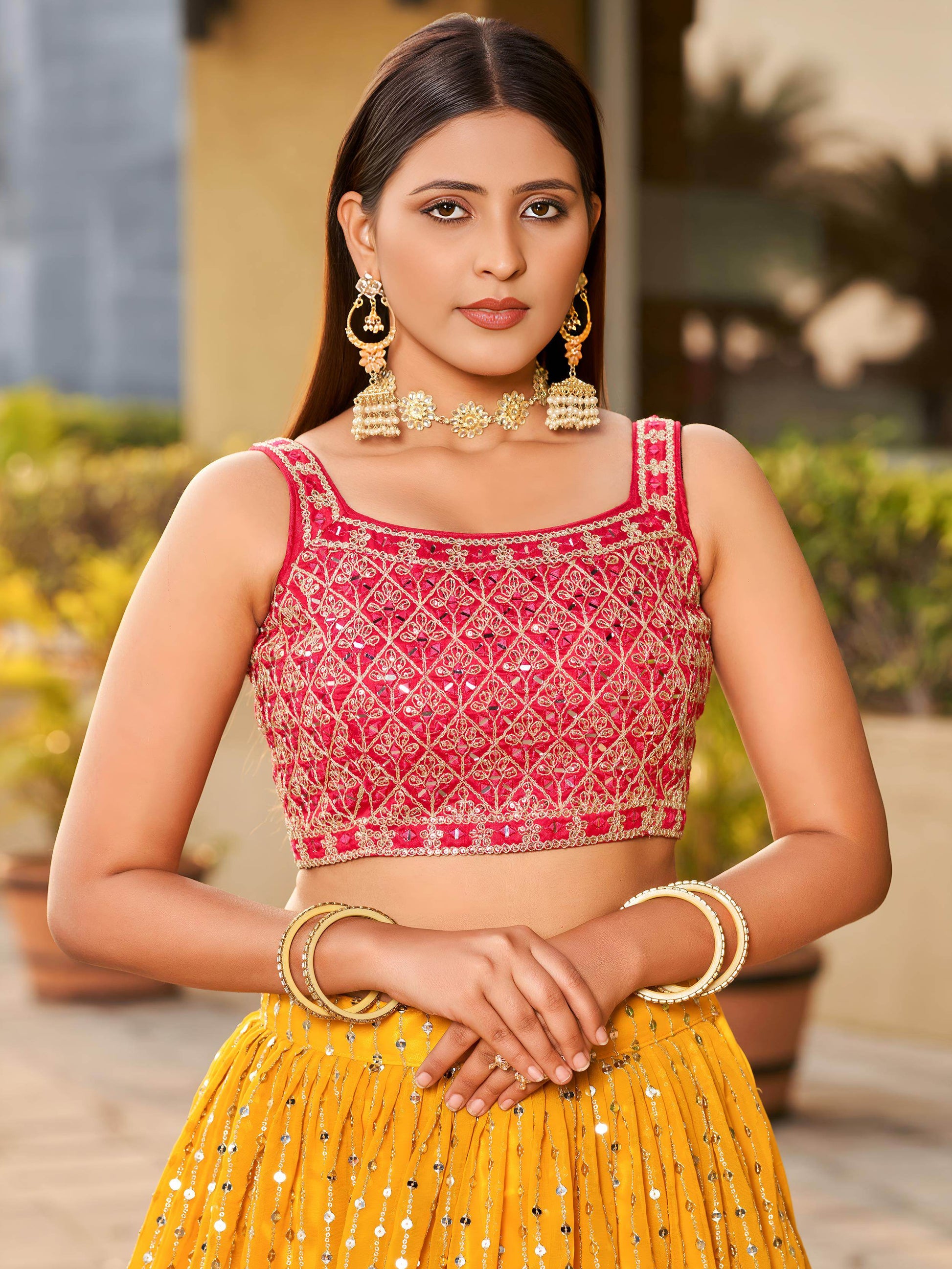 Fascinating Yellow Sequins Georgette Traditional Lehenga Choli