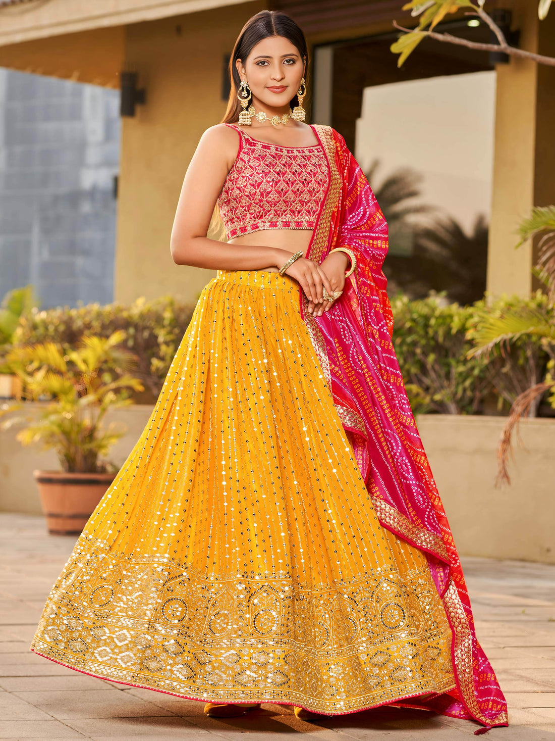 Fascinating Yellow Sequins Georgette Traditional Lehenga Choli