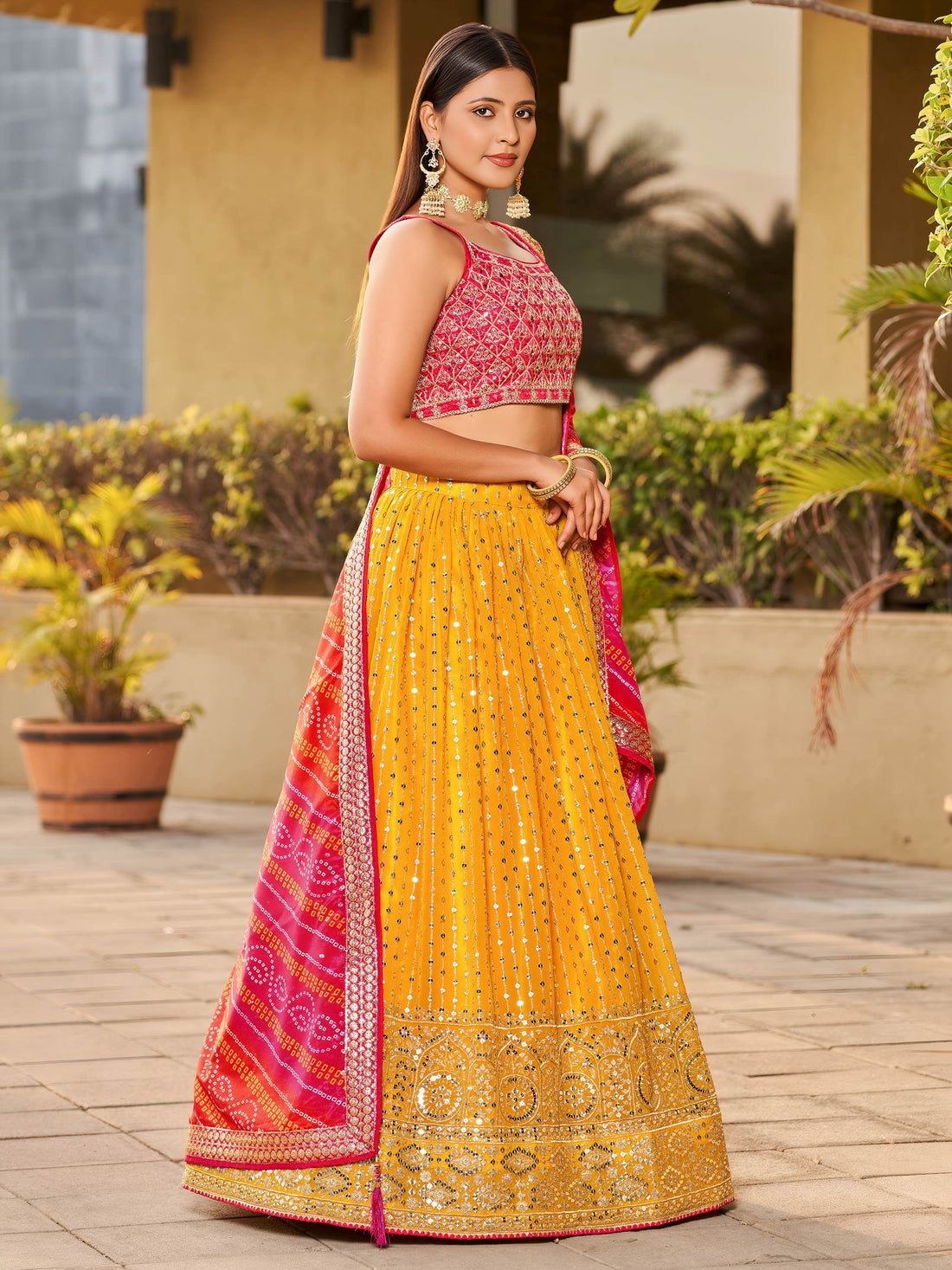 Fascinating Yellow Sequins Georgette Traditional Lehenga Choli