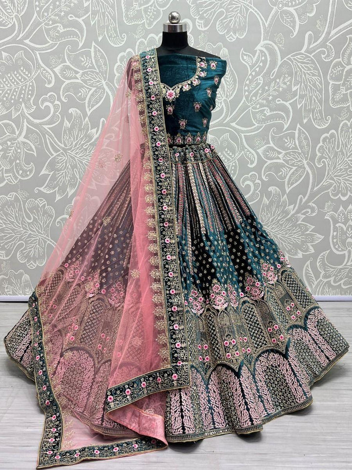 Attractive Teal Blue Embroidery Velvet Reception Wear Lehenga Choli