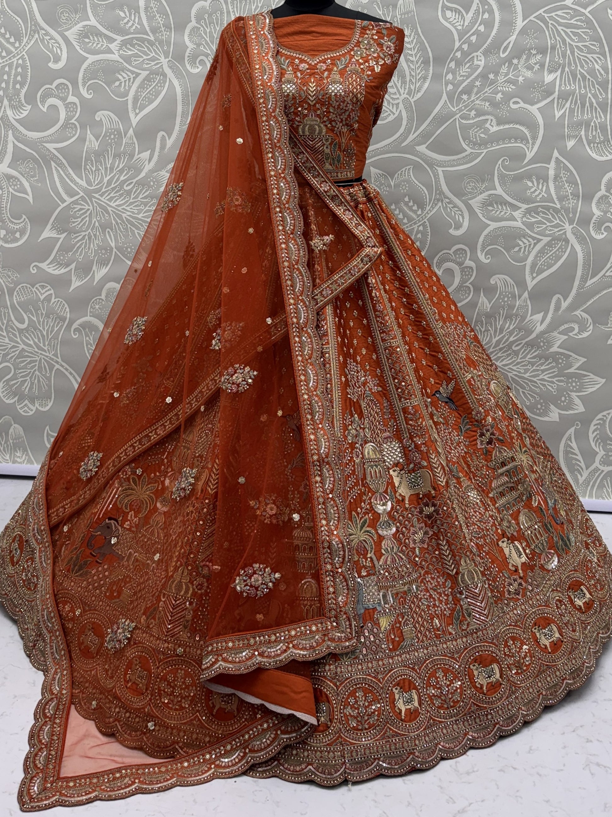 Tremendous Rust Orange Zari Work Silk Bridal Lehenga Choli With Double Dupatta
