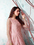 Pink floral embroidered dress with sheer sleeves, gold jewelry, and elegant styling for women's fashion