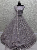 Adorable Lavender Sequins Work Net Bridesmaid Lehenga Choli With Dupatta - Zeel Clothing