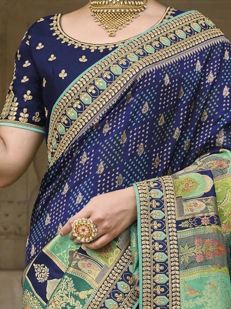 Navy blue saree with gold and green embroidery, traditional Indian women's fashion