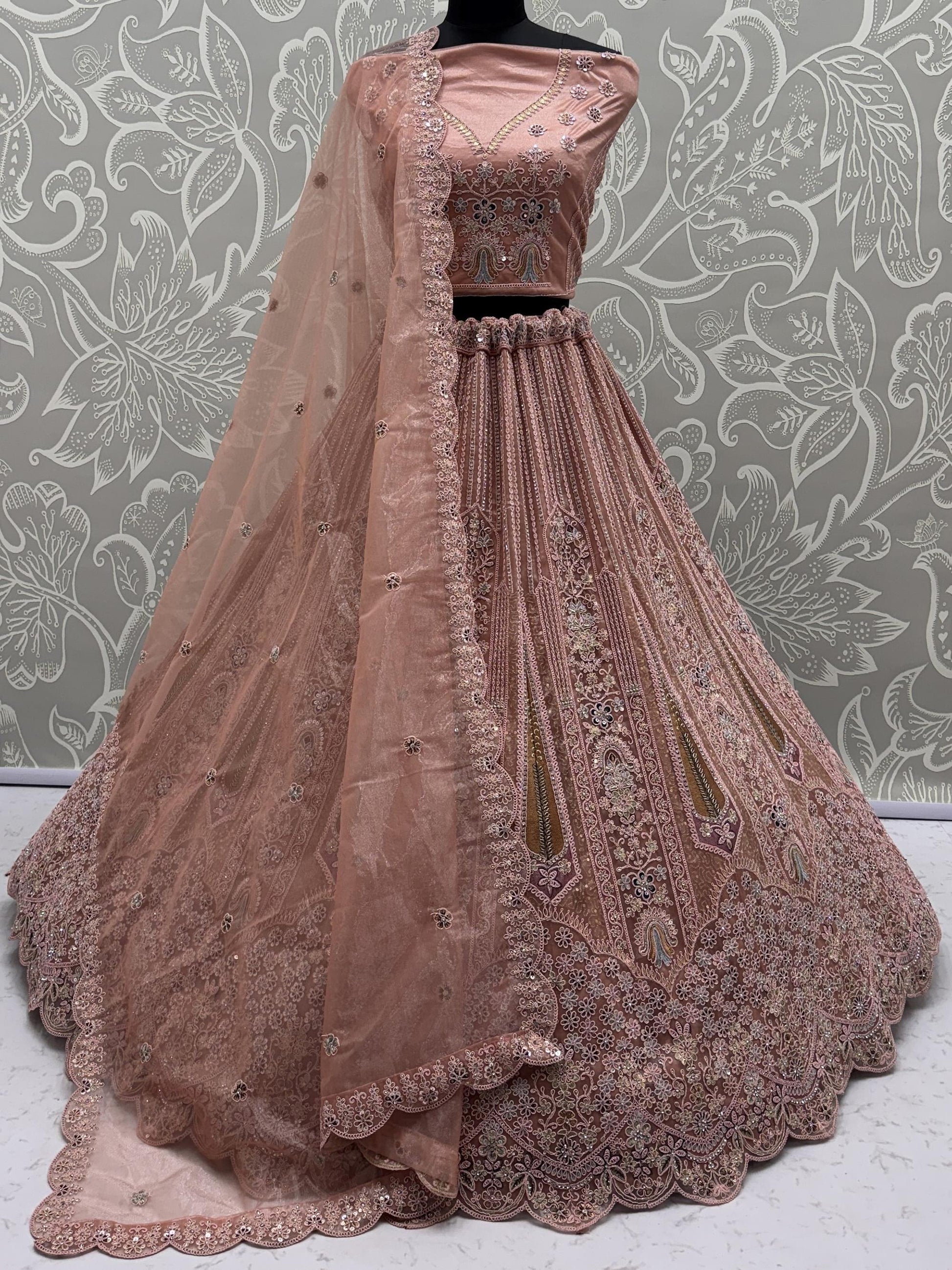 Adorable Peach Zircon Work Net Wedding Wear Lehenga Choli With Dupatta