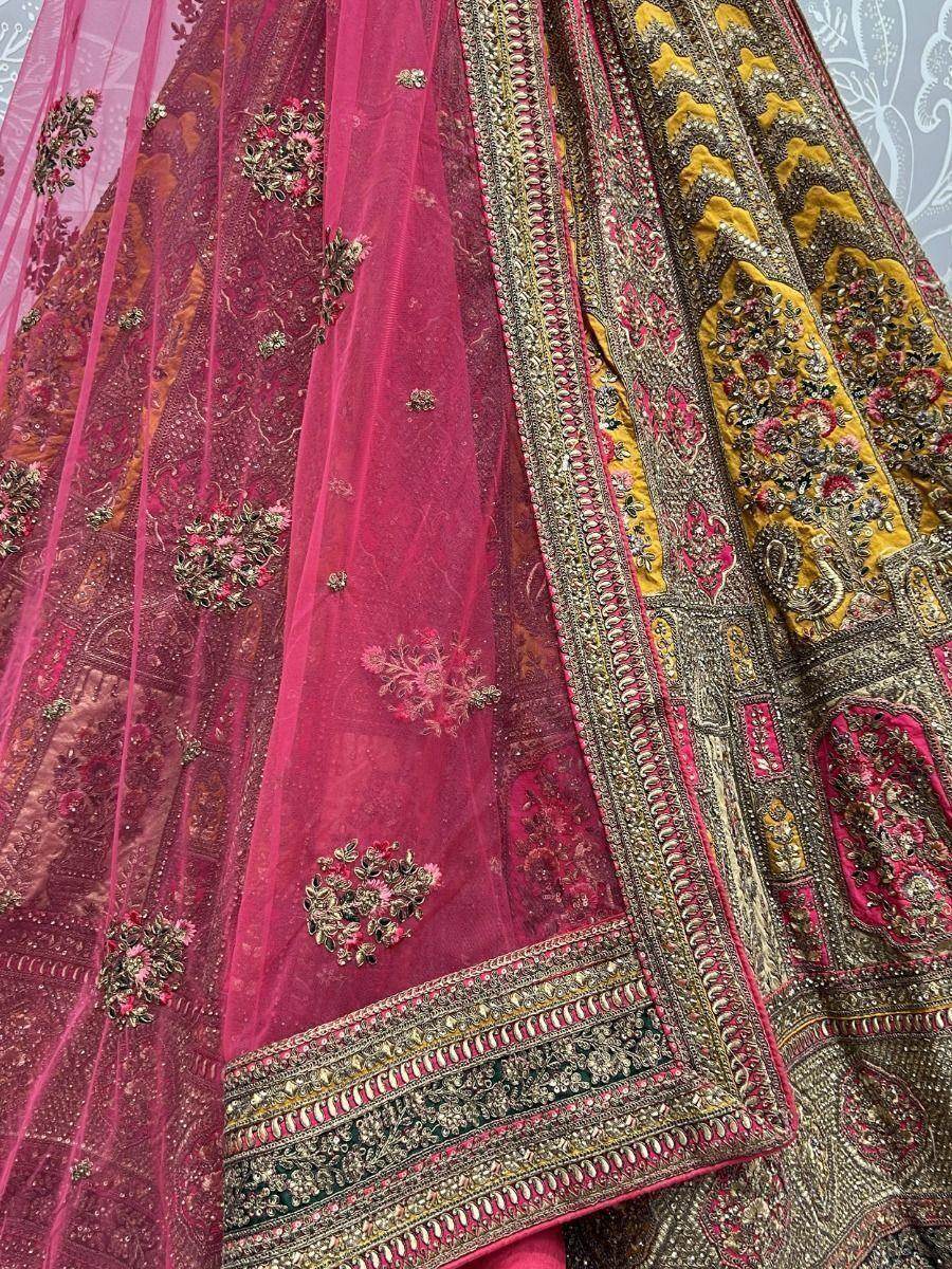 Adorable Yellow And Pink Embroidered Velvet Bridal Wear Lehenga Choli - Zeel Clothing