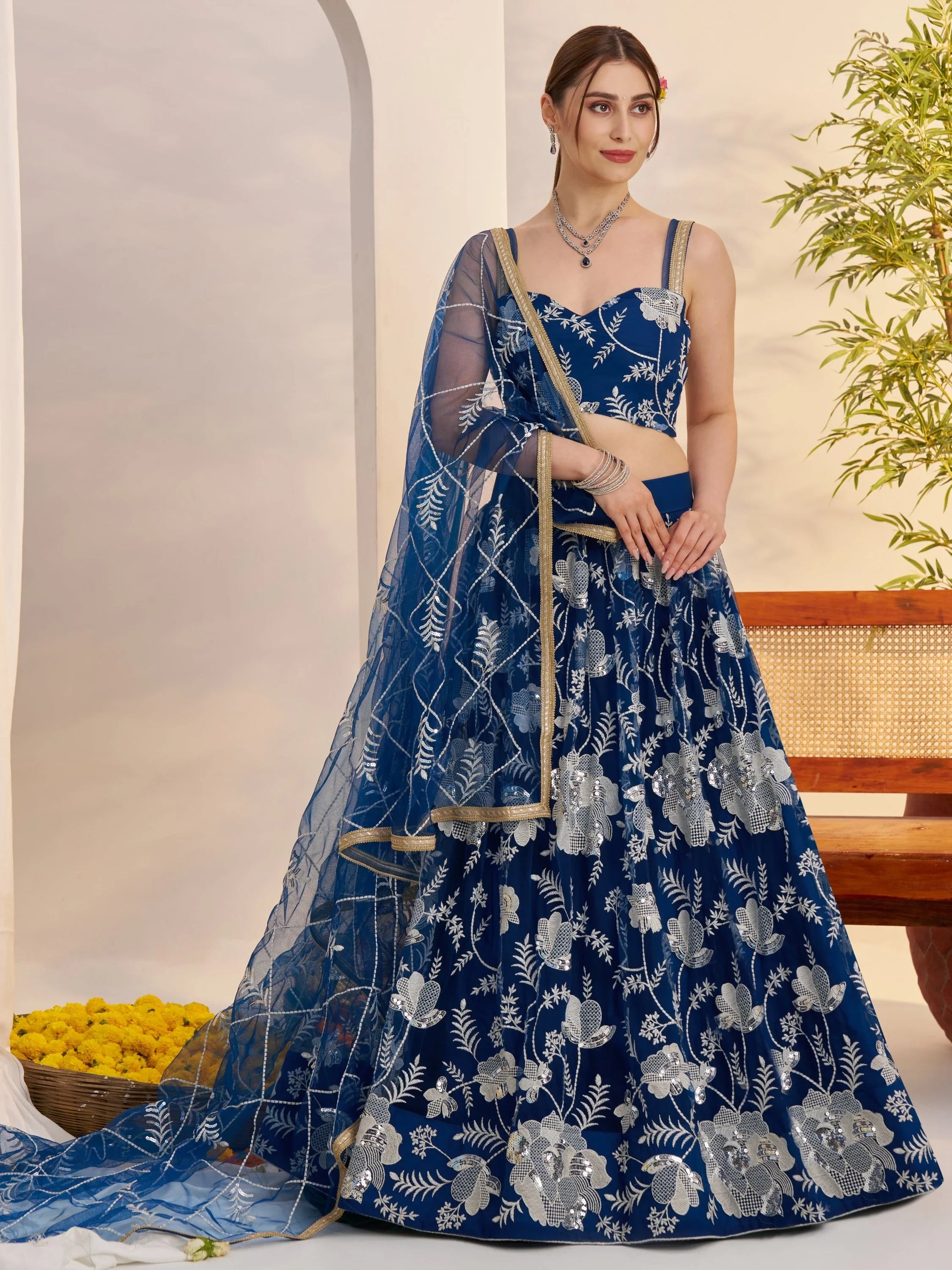 Adoring Teal Blue Floral Embroidery Net Engagement Wear Lehenga Choli