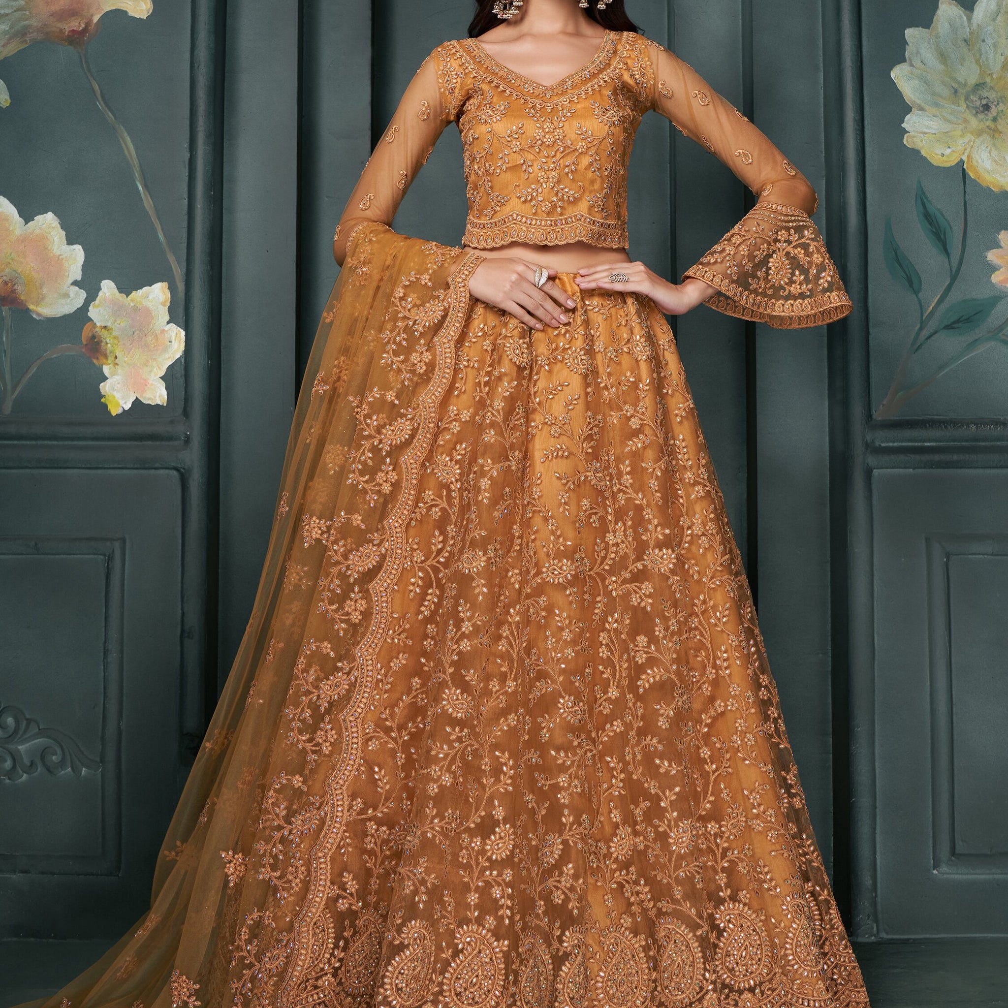 Fascinating Orange Thread Work Net Engagement Wear Lehenga Choli