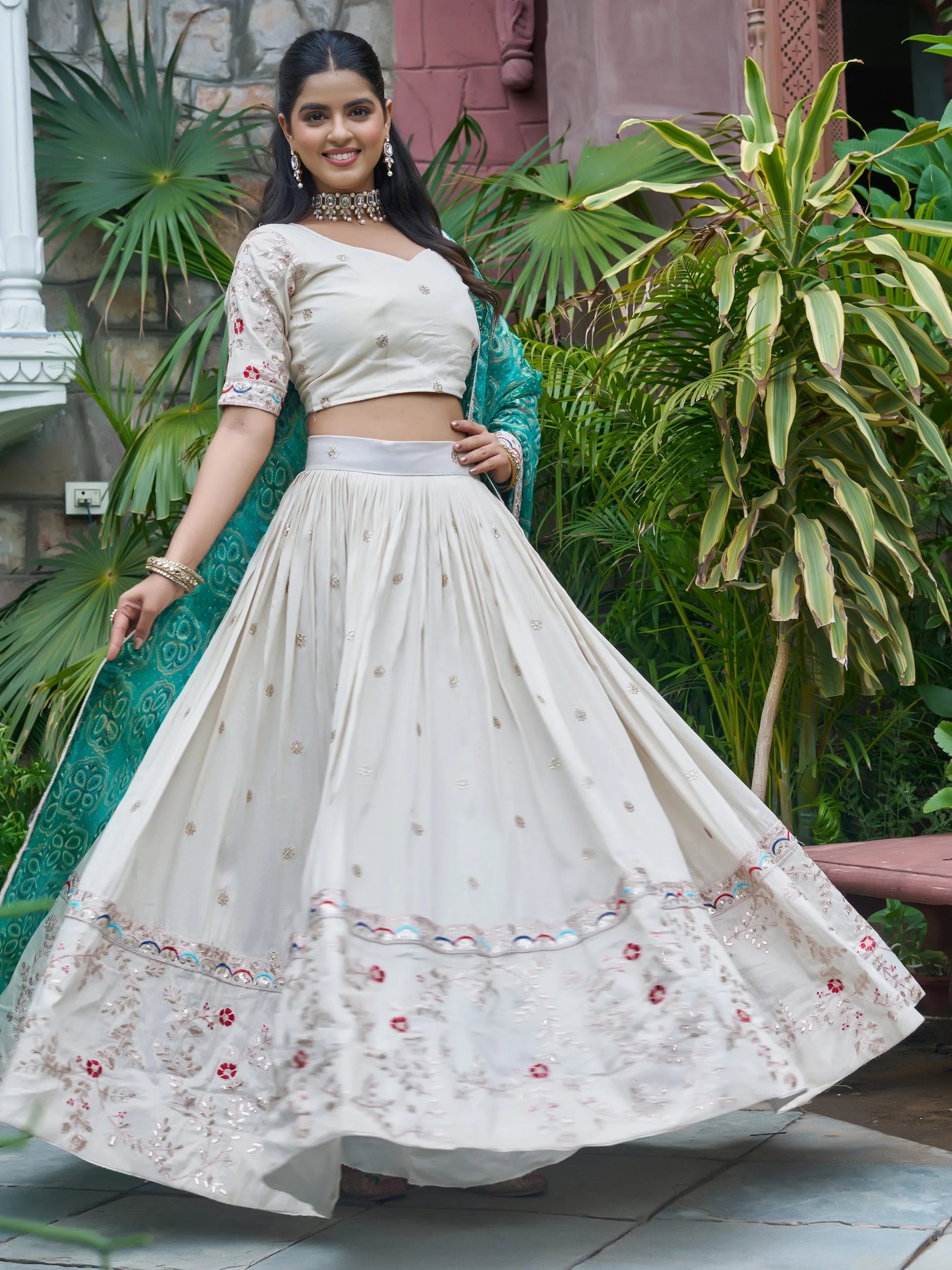 Alluring Off-White Embroidered Silk Lehenga Choli With Teal Dupatta