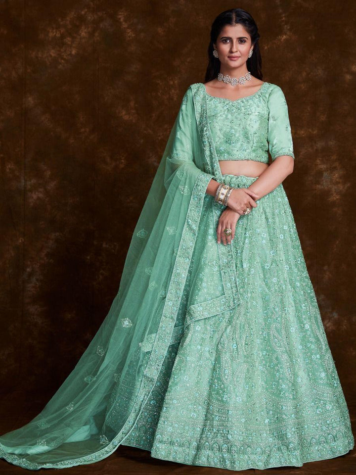 Alluring Pista Green Embroidered Organza Reception Wear Lehenga Choli