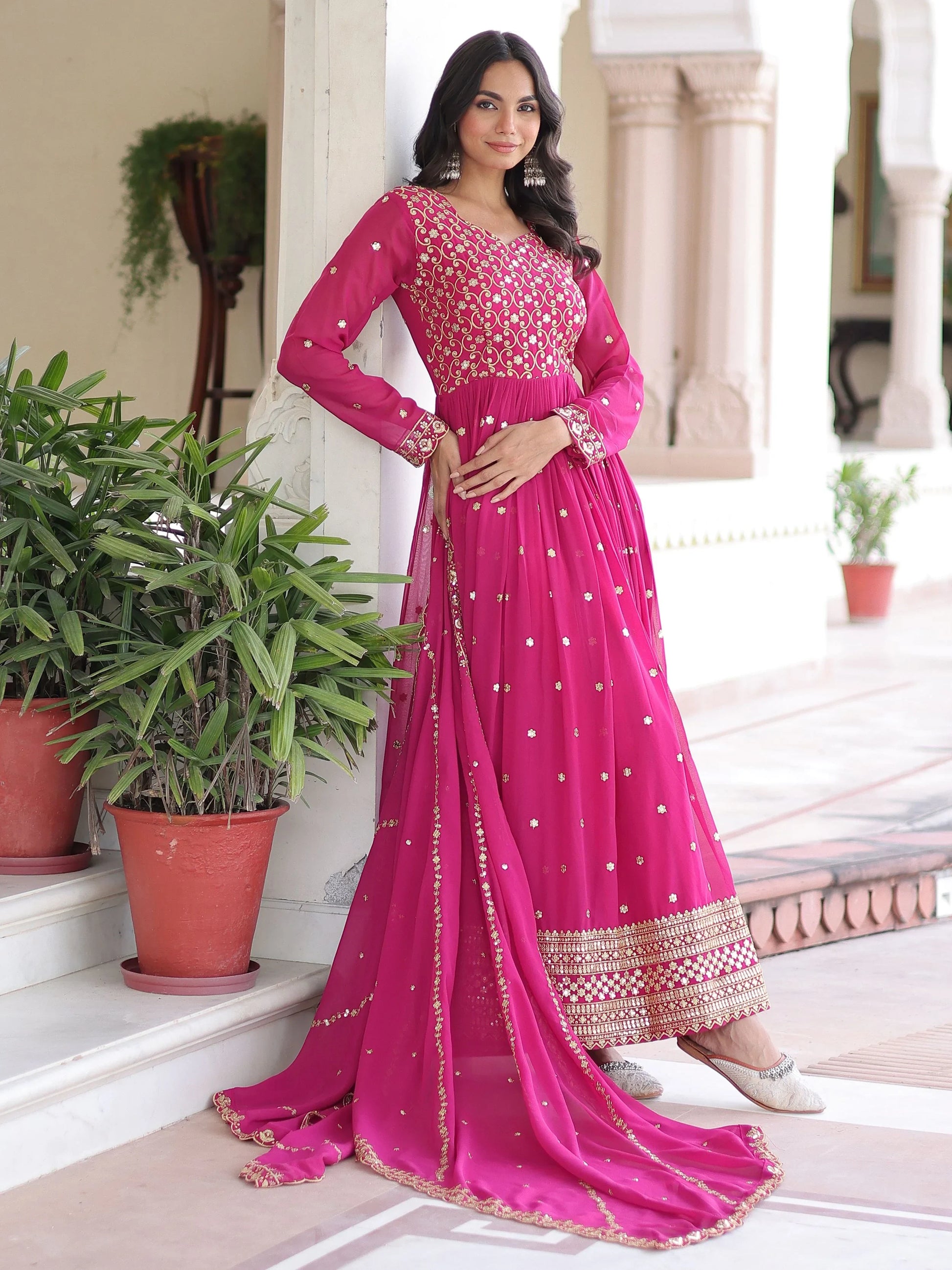Alluring Rani Pink Zari Work Georgette Designer Gown With Dupatta