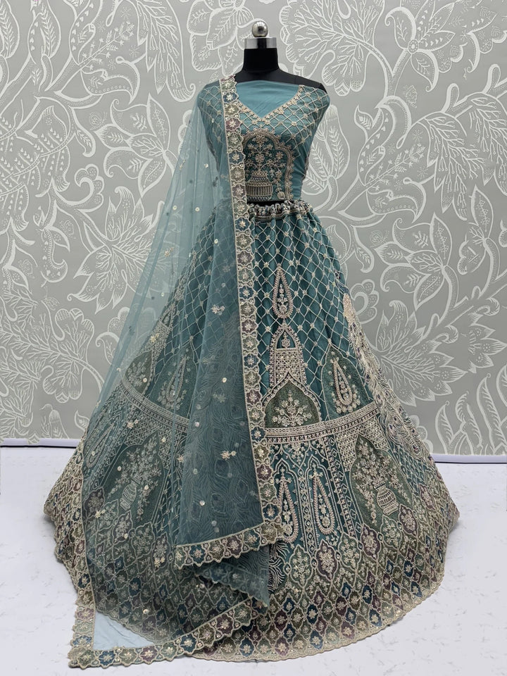 Alluring Teal Blue Zari Work Net Wedding Wear Lehenga Choli With Dupatta