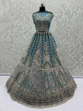Alluring Teal Blue Zari Work Net Wedding Wear Lehenga Choli With Dupatta