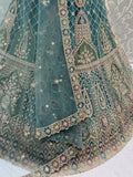 Alluring Teal Blue Zari Work Net Wedding Wear Lehenga Choli With Dupatta