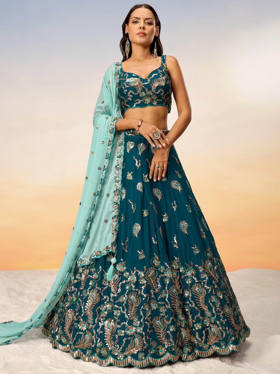 Alluring Teal Green Sequins Georgette Sangeet Wear Lehenga Choli